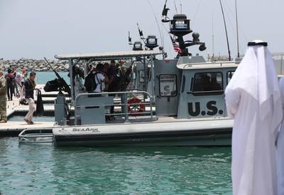 Journalists board a US Navy patrol boat at the US Navy 5th Fleet base near Fujairah. AP Photo