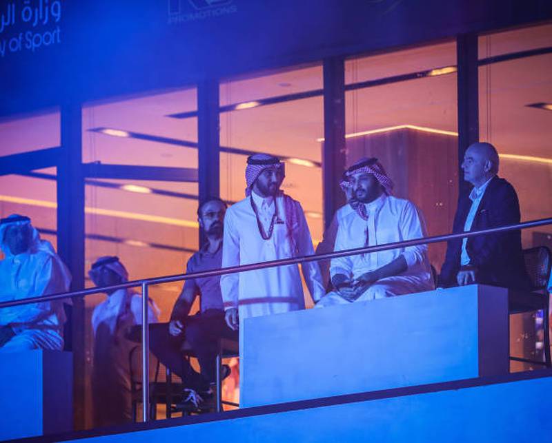 Crown Prince Mohammed bin Salman, second right, and Fifa president Gianni Infantino at the King Abdullah Sports City Arena in Jeddah on Saturday night. Getty