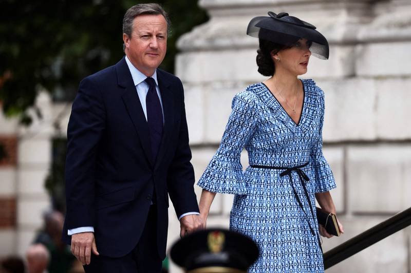 Former British prime minister David Cameron and his wife Samantha arrive for the service of thanksgiving. AFP