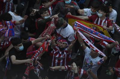 Supporters gather at Neptuno square after Atletico Madrid won the La Liga. AFP