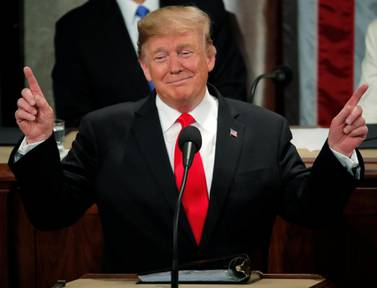 U.S. President Donald Trump gestures during his State of the Union address to a joint session of Congress on Capitol Hill in Washington, U.S., February 5, 2019. REUTERS/Jim Young - HP1EF2609Y97U TPX IMAGES OF THE DAY