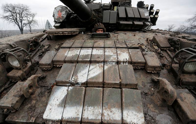A pro-Russian fighter sits inside a tank in the separatist self-proclaimed Luhansk People's Republic, in the Luhansk region, Ukraine. Reuters