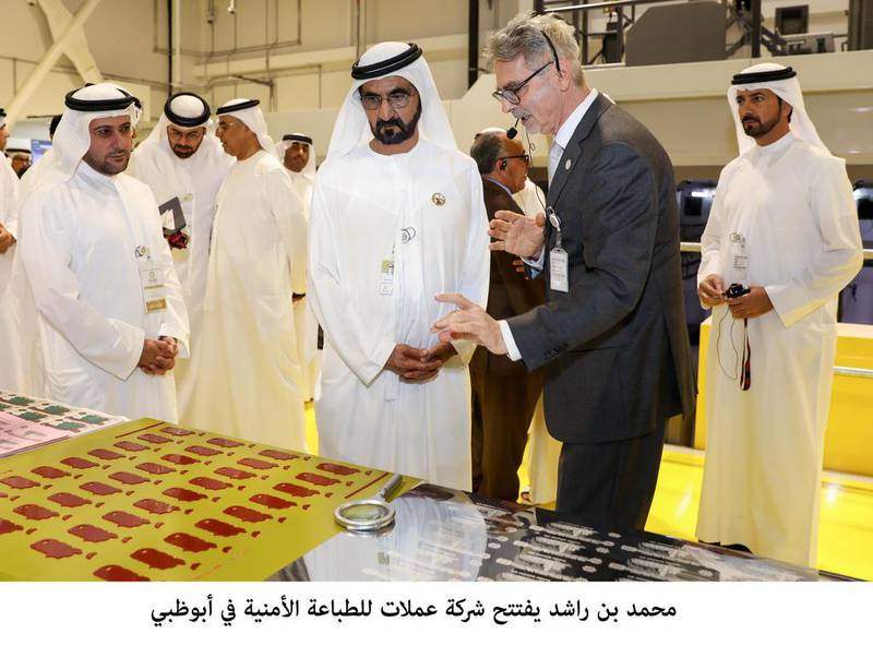 Sheikh Mohammed bin Rashid, Vice President and Ruler of Dubai, is briefed by the Governor of the UAE Central Bank Mubarak Rashed Al Mansoori about the facility’s production machinery. Wam