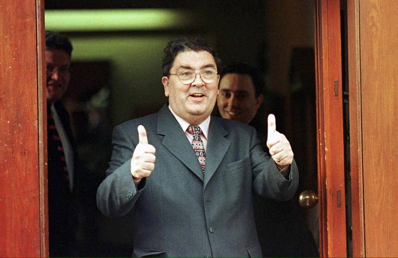 John Hume in buoyant mood on May 21, 1998, as he arrives for a breakfast meeting with then British prime minister Tony Blair and Ulster Unionist leader David Trimble at Dunadry Hotel to encourage a Yes vote for a Northern Ireland peace referendum. EPA