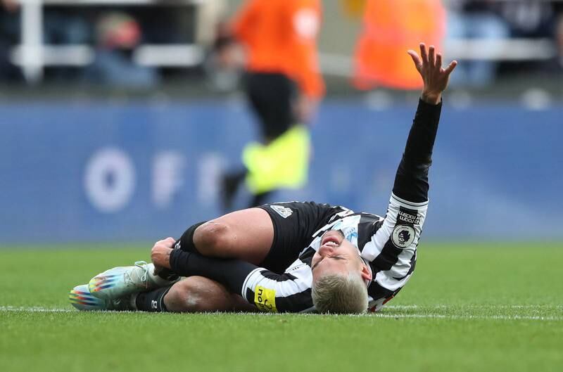 Newcastle midfielder Bruno Guimaraes after injuring his ankle in the first-half that would see him substituted at the break. Reuters