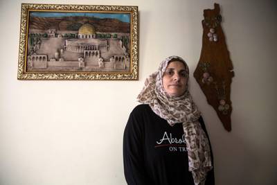 SaÕadiya Saftawi, 48,at her home in Gaza City on November 11,2018. She has three sons abroad, a husband in Israeli prison, and two daughters left in Gaza Ð who dream of getting out.She worries about what will happen to her sons Ñ one a refugee in America, another who was smuggled from Algeria into Spain and now has asylum, and a third who just left for Turkey in July. (Photo by Heidi Levine for The National).