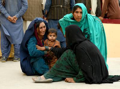 Relatives react in front of a hospital, where their family member has been transferred for treatment after a truck bomb blast in Balkh province, in Mazar-i-Sharif, Afghanistan August 25, 2020. REUTERS/Stringer NO RESALES. NO ARCHIVES.