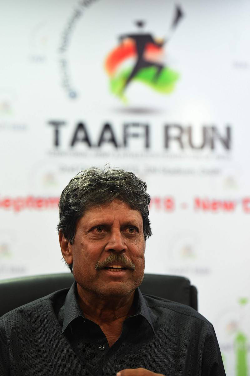 Former Indian cricketer and the brand ambassador of the TAAFI Run Kapil Dev addresses a press conference in New Delhi on September 3, 2018. - Indian Territorial Army and the Athletics Federation of India will be organising the first official National Marathon of India or "Territorial Army and Athletics Federation of India Run (TAAFI Run)" on October 2, to celebrate the Indian Territorial Army. (Photo by Prakash SINGH / AFP)