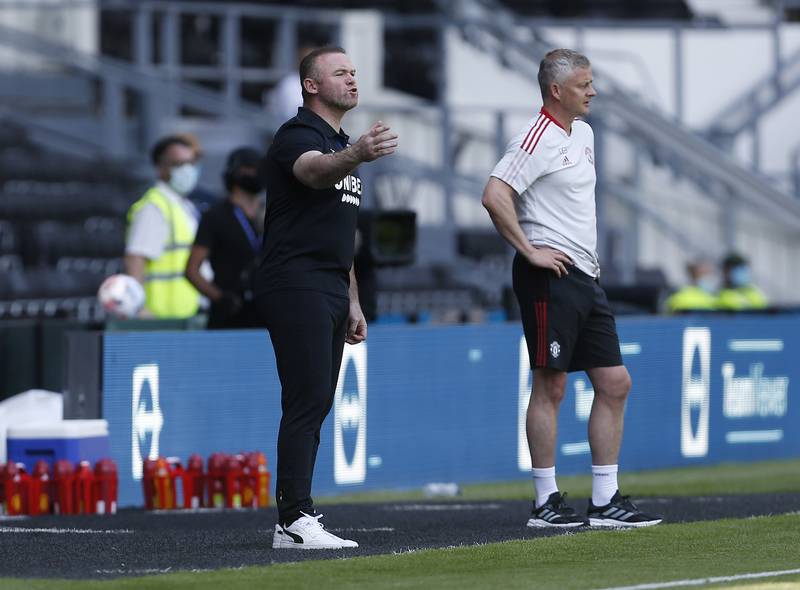 Derby County manager Wayne Rooney and his United counterpart Ole Gunnar Solskjaer