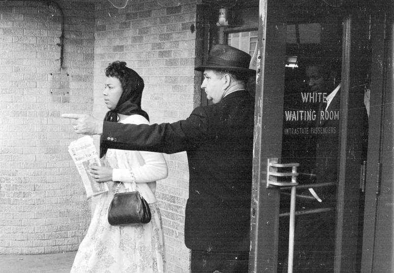 25th May 1961:  A black woman is directed away from the 'white waiting room' at Jackson, Mississippi. She has arrived on the 'Freedom Bus' to protest against the racial segregation of passengers on the nation's buses.  (Photo by William Lovelace/Express/Getty Images)