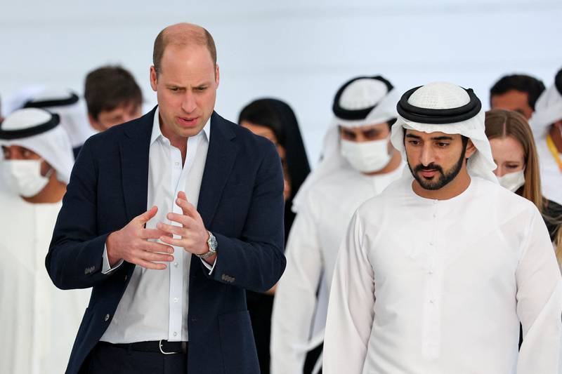 Britain's Prince William speaks with Dubai's Crown Prince Sheikh Hamdan bin Mohammed Al Maktoum during a tour at the Expo 2020 in Dubai, United Arab Emirates, February 10, 2022.  Chris Jackson/Pool via REUTERS