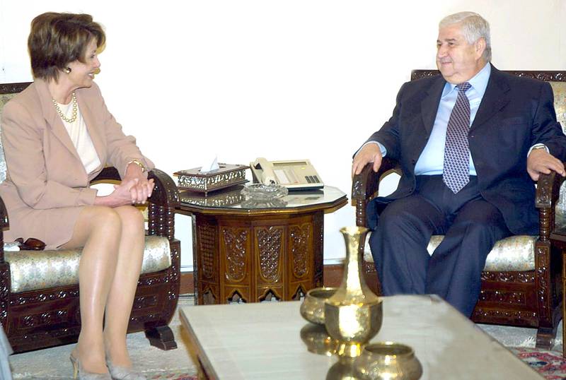 Syrian Foreign Minister Walid Muallen (R) meets US House speaker Nancy Pelosi in Damascus, 04 April 2007 during her two-day trip to Syria  that has infuriated the White House. US President George W. Bush said Pelosi's visit sent "mixed signals" that harmed his administration's efforts to isolate Assad's regime over its alleged support for terrorism and accusations of meddling in Iraq and Lebanon.  AFP PHOTO/HO/SANA (Photo by SANA / AFP)