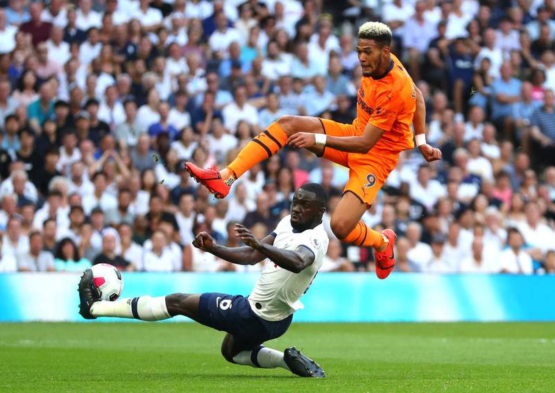 LONDON, ENGLAND - AUGUST 25: Joelinton of Newcastle United is challenged by Davinson Sanchez of Tottenham Hotspur during the Premier League match between Tottenham Hotspur and Newcastle United at Tottenham Hotspur Stadium on August 25, 2019 in London, United Kingdom. (Photo by Catherine Ivill/Getty Images)