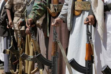 Houthi tribesmen hold their weapons during a gathering to show support for the movement in Sanaa. AP, file