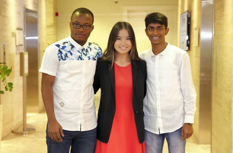 DUBAI , UNITED ARAB EMIRATES, September 25 , 2018 :- Left to Right - Tunde Oyebamiji from Nigeria , Aidana Omurova from Kyrgyzstan and Vijay Kumar from India during the break in the welcome class of 2018 Crossroads Emerging Leaders Program held at DIFC Academy in Dubai. ( Pawan Singh / The National )  For News. Story by Anam Rizvi