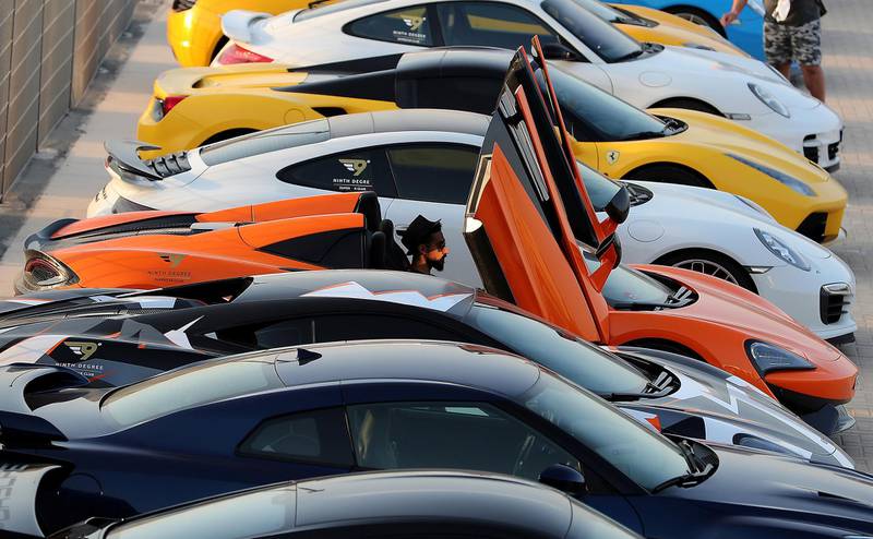 DUBAI, UNITED ARAB EMIRATES, August 31 – 2018 :- Members and Guests of the Ninth Degree supercars club parked their cars during the Ninth Degree supercars club meet held at Dubai Autodrome in Dubai. ( Pawan Singh / The National )  For Motoring. Story by Adam Workman