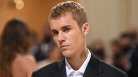 Justin Bieber remains 'upbeat' despite postponing remaining US Justice tour dates
