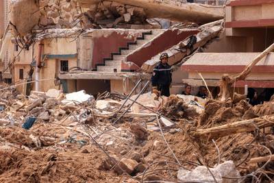 Rescue teams assist in relief work in Libya's eastern city of Derna on September 17. AFP