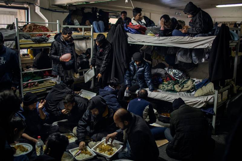 Migrants mostly from Bangladesh are living in an overcrowded room in the Miral camp in Velika Kladusa.