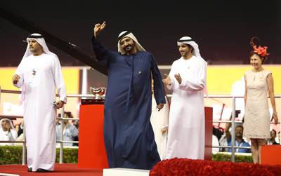 DUBAI , UNITED ARAB EMIRATES Ð Mar 29 , 2014 : Sheikh Mohammed bin Rashid Al Maktoum , UAE Vice President and Prime Minister and Ruler of Dubai  in a jubilant mood after African Story ( GB ) number 6 ridden by Silvestre De Sousa won the Dubai World Cup 9th horse race ( 2000m All Weather ) at the Meydan Racecourse in Dubai. ( Pawan Singh / The National ) For Sports. Story by Jonathan Raymond
