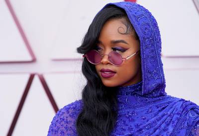 H.E.R. arrives to the Oscars red carpet for the 93rd Academy Awards in Los Angeles, California, US, April 25, 2021. Reuters