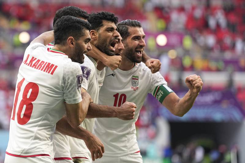 Iran's players celebrate their win over Wales at the World Cup 2022 at the Ahmad Bin Ali Stadium on Friday, November 25, 2022. AP