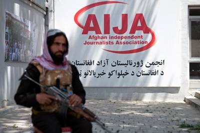 A Taliban gunman on patrol at a World Press Freedom Day event at the office of the Afghan Independent Journalists Association in Kabul. AP