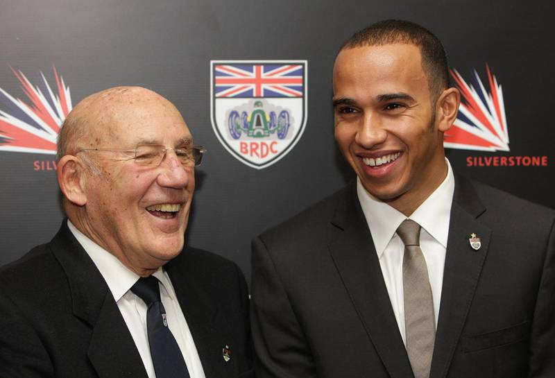 Sir Stirling Moss and Formula One world champion Lewis Hamilton in 2008. PA