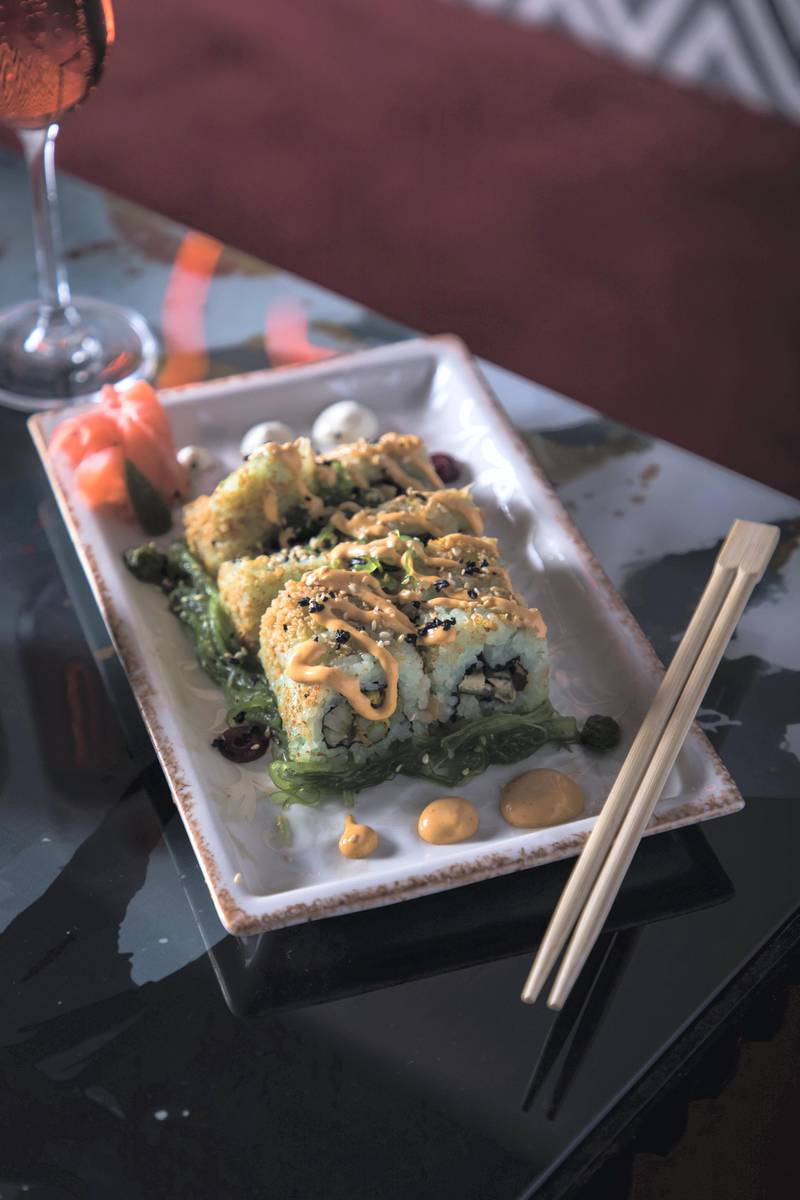 Sushi with asparagus tempura.