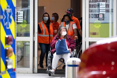 Officials on Tuesday began removing dozens of people who have been sleeping at the city's airport during the coronavirus pandemic. AP