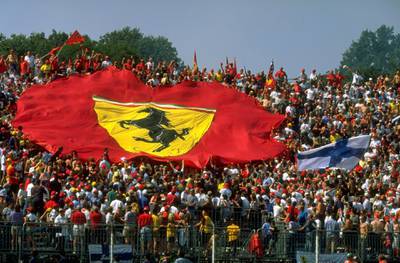 12 Sep 1999:  The Ferrari Tifosi and Finnish fans flag waving at the Italian Formula One Grand Prix at Monza in Italy. \ Mandatory Credit: Michael Cooper /Allsport