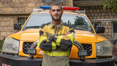 Mohammad Sultan, 19, is a car mechanic and firefighting volunteer who uses his skills to maintain the fire trucks. Matt Kynaston / The National