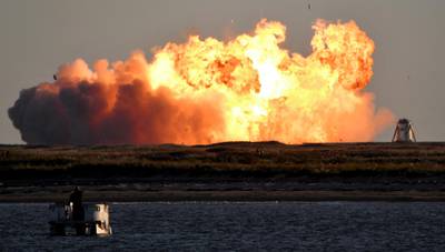 SpaceX's first super heavy-lift Starship SN8 rocket explodes during a return-landing attempt after it launched from their facility on a test flight in Boca Chica, Texas U.S. December 9, 2020. REUTERS/Gene Blevins