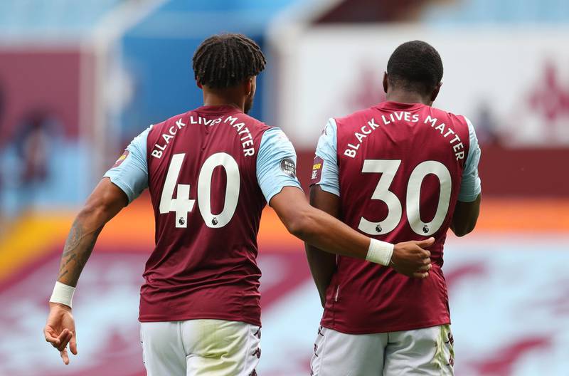Aston Villa's Tyrone Mings and Kortney Hause with messages in support of the Black Lives Matter campaign. Reuters