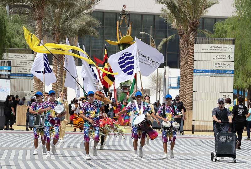 Artists performing during the parade at the EXPO 2020 site in Dubai on 3 October, 2021. Pawan Singh/The National.