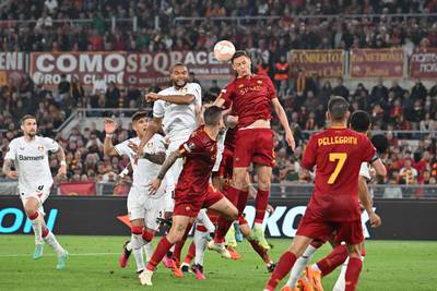 Roma's Serbian midfielder Nemanja Matic jumps for the ball. AFP