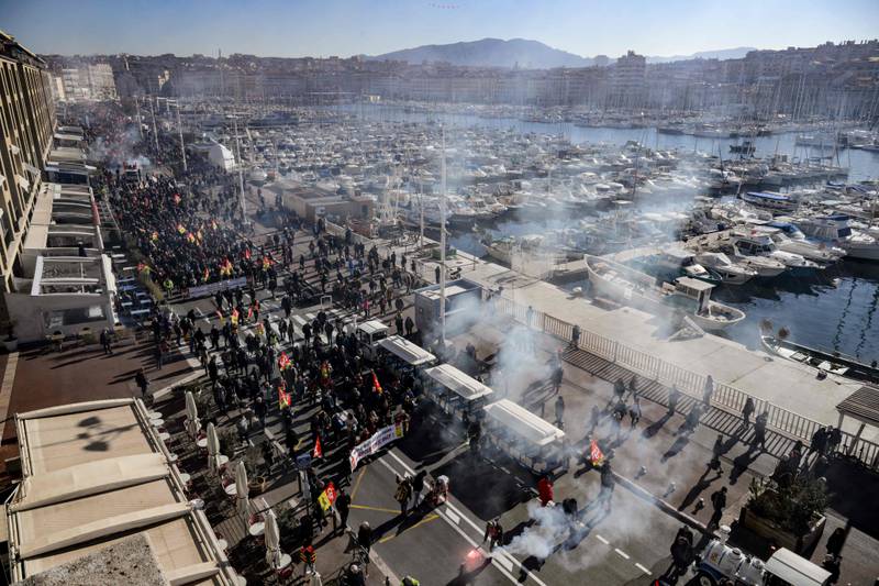 People protest in Marseille on a nationwide day of strikes and rallies against plans to increase France's age of retirement from 62 to 64. AFP