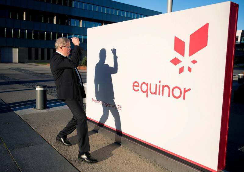 epa08562928 (FILE) - Eldar Saetre, the CEO of Norwegian natural gas and oil company Equinor, looks at his own shadow cast on an equinor sign after the presentation of the company's Q3 results, outside their headquarters in Fornebu, Norway, 25 October 2018 reissued 23 July 2020). Equinor, previously named Statoil, is due to release their 2nd quarter 2020 results on 24 July 2020.  EPA/VIDAR RUUD NORWAY OUT *** Local Caption *** 54726161
