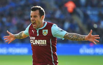 Ross Wallace of Burnley celebrates as he scores their second and equalising goal during a 2-2 draw with Leicester City on Saturday at the King Power Stadium in Leicester. Laurence Griffiths / Getty Images