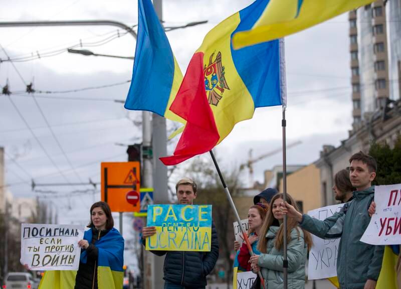 Ukrainian refugees and Moldovan citizens protest against the war in Ukraine outside the Russian embassy in Chisinau, Moldova. EPA