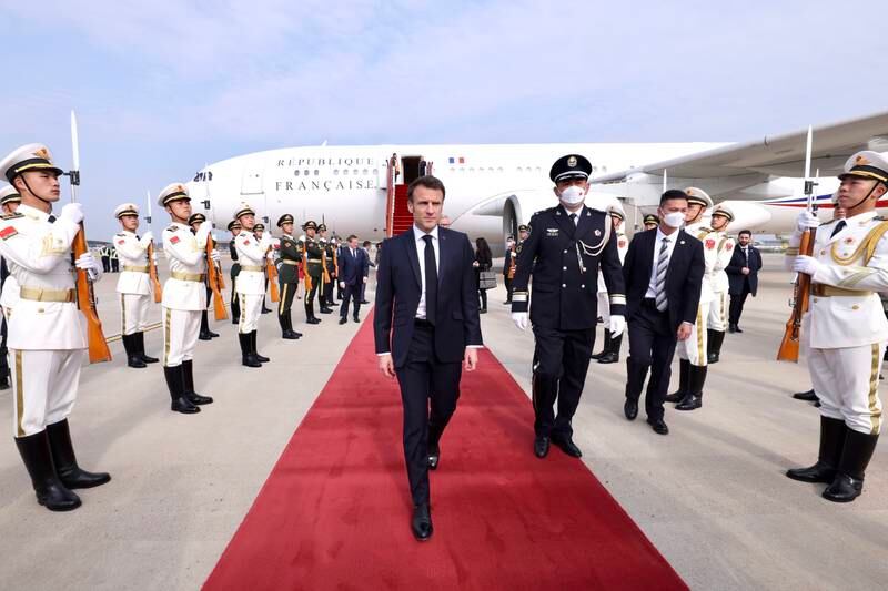 Emmanuel Macron arrives at Beijing Capital International Airport. EPA