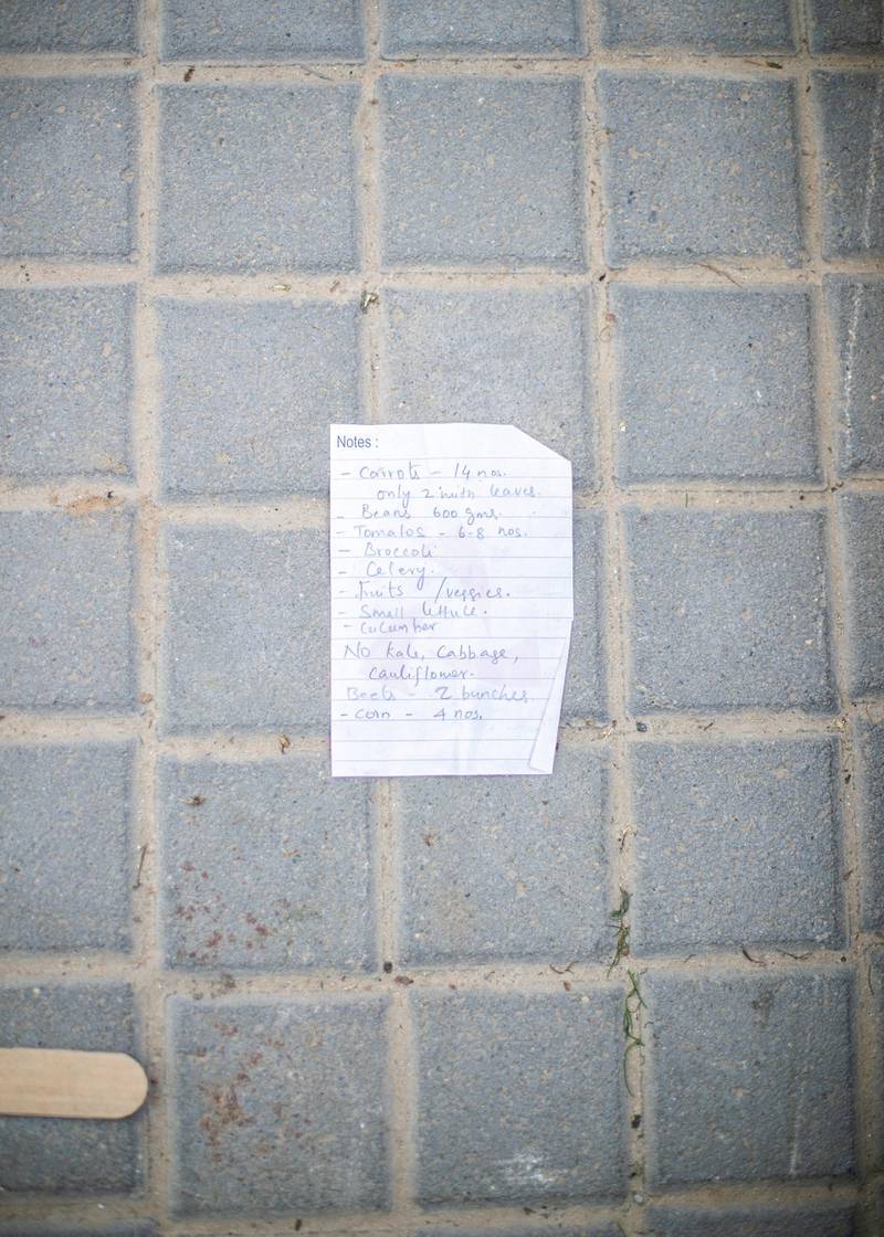 DUBAI, UNITED ARAB EMIRATES. 19 FEBRUARY 2021. A grocery list on the floor at Farmer's Market at Bay AvenuePhoto: Reem Mohammed / The NationalReporter: Patrick Ryan