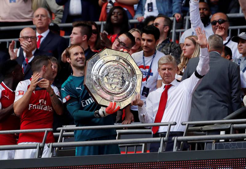 Soccer Football - Chelsea vs Arsenal - FA Community Shield - London, Britain - August 6, 2017   Arsenal manager Arsene Wenger and Petr Cech celebrate with the trophy after winning the FA Community Shield   Action Images via Reuters/Andrew Couldridge     TPX IMAGES OF THE DAY