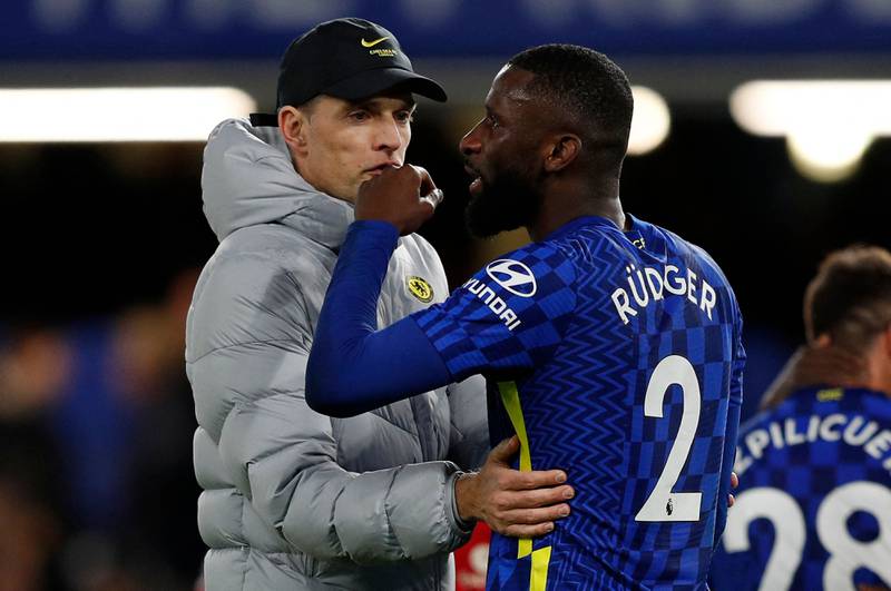 Chelsea's German head coach Thomas Tuchel embraces defender Antonio Rudiger after the Premier League match against Liverpool at Stamford Bridge in London on January 2, 2022. AFP