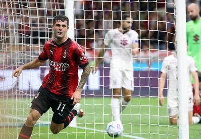 AC Milan's Christian Pulisic celebrates after scoring against Torino. EPA