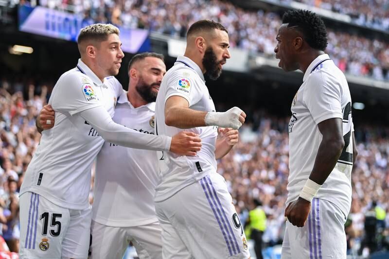 Karim Benzema celebrates with Federico Valverde, Dani Carvajal and Vinicius Junior after scoring in the 3-1 La Liga win against Barca at the Bernabeu on October 16, 2022. Getty