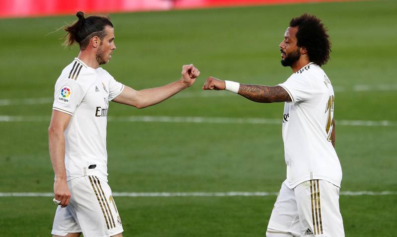Marcelo and Gareth Bale celebrate the win. Reuters