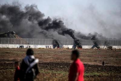 Palestinian protesters during clashes with Israeli troops on the eastern border of the Gaza Strip. EPA