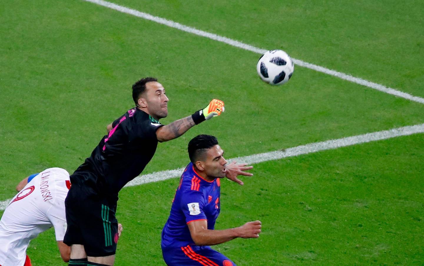 epa06837441 Goalkeeper David Ospina of Colombia clears the ball during the FIFA World Cup 2018 group H preliminary round soccer match between Poland and Colombia in Kazan, Russia, 24 June 2018.

(RESTRICTIONS APPLY: Editorial Use Only, not used in association with any commercial entity - Images must not be used in any form of alert service or push service of any kind including via mobile alert services, downloads to mobile devices or MMS messaging - Images must appear as still images and must not emulate match action video footage - No alteration is made to, and no text or image is superimposed over, any published image which: (a) intentionally obscures or removes a sponsor identification image; or (b) adds or overlays the commercial identification of any third party which is not officially associated with the FIFA World Cup)  EPA/DIEGO AZUBEL   EDITORIAL USE ONLY