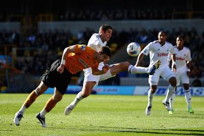 WOLVERHAMPTON, ENGLAND - OCTOBER 22: Danny Graham of Swansea City battles with Stephen Ward of Wolves during the Barclays Premier League match between Wolverhampton Wanderers and Swansea City at Molineux on October 22, 2011 in Wolverhampton, England.  (Photo by Laurence Griffiths/Getty Images) *** Local Caption ***  129916411.jpg
